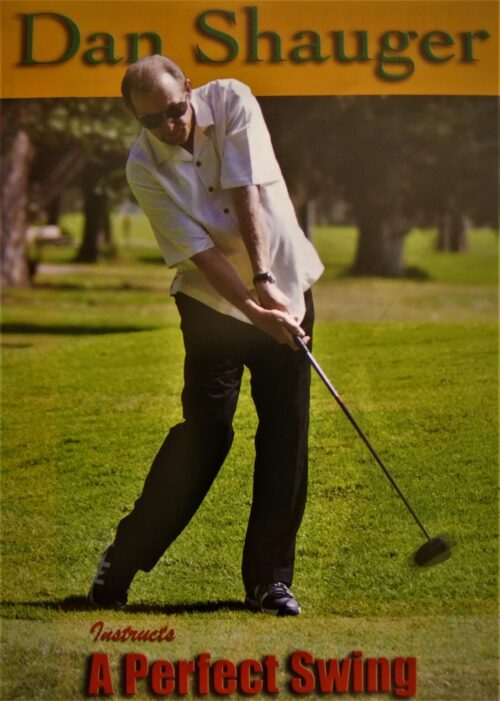 Golfer preparing to swing a golf club on a sunny course.